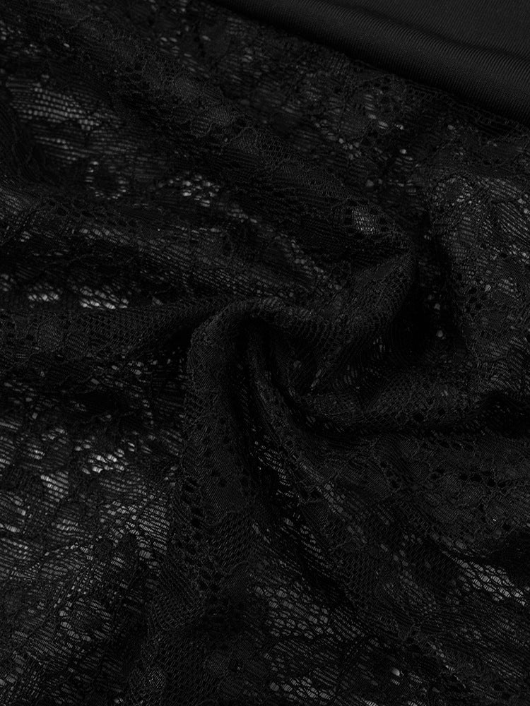 Close-up of black lace fabric with a subtle pattern