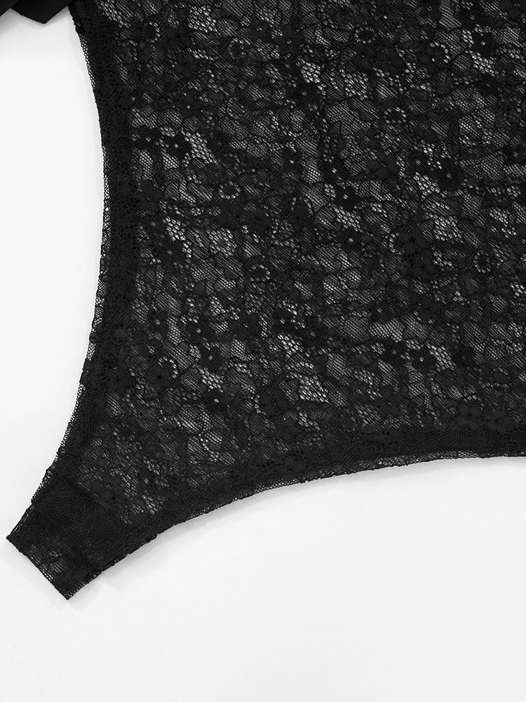 Black lace garment on a white background