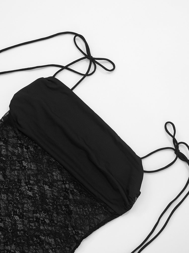 Black strapless top with textured black fabric on a white background