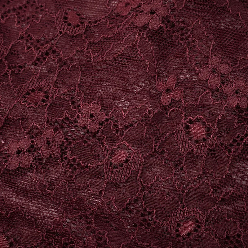 Close-up of dark red lace fabric