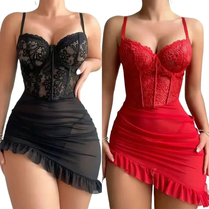 Black and red lace corsets on mannequins with a plain background